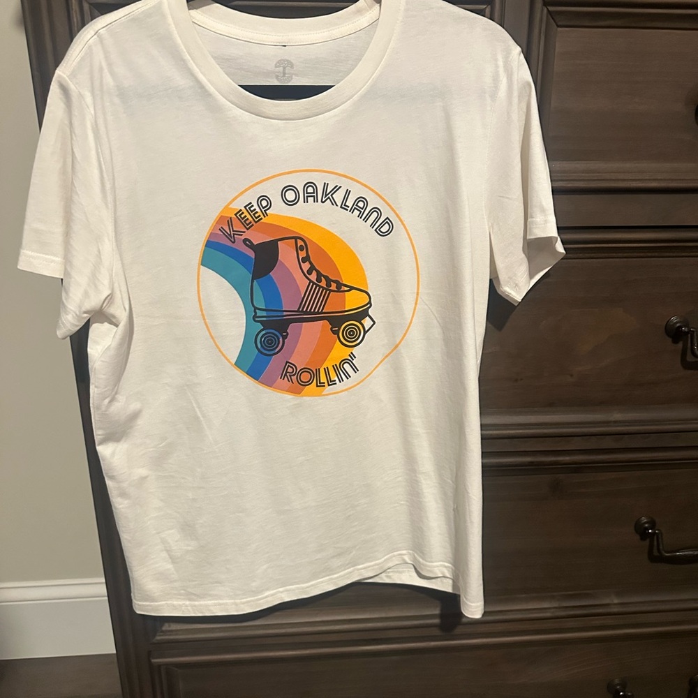 White Graphic Tee with Roller Skate Design